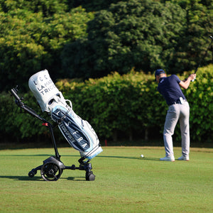 Golf cart in following mode, tracking the player effortlessly while maintaining a safe distance